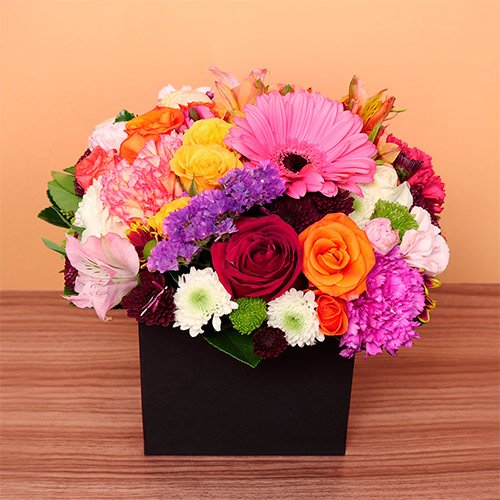 Box com mix de flores coloridas Aniversário Giuliana Flores