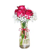 Trio de rosas no vidro